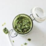 A dish of chimichurri - a green, herby Argentinian sauce