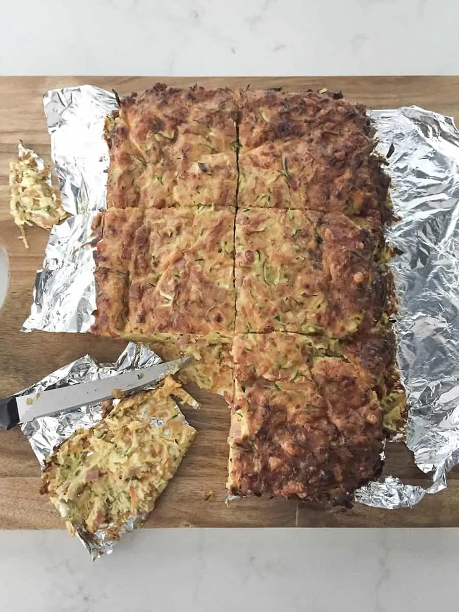 Zucchini slice that has failed to come off the foil it was baked in